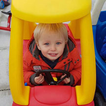 Child in play car