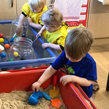 Nursery children with toys in Wrexham