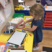 Nursery children with toys